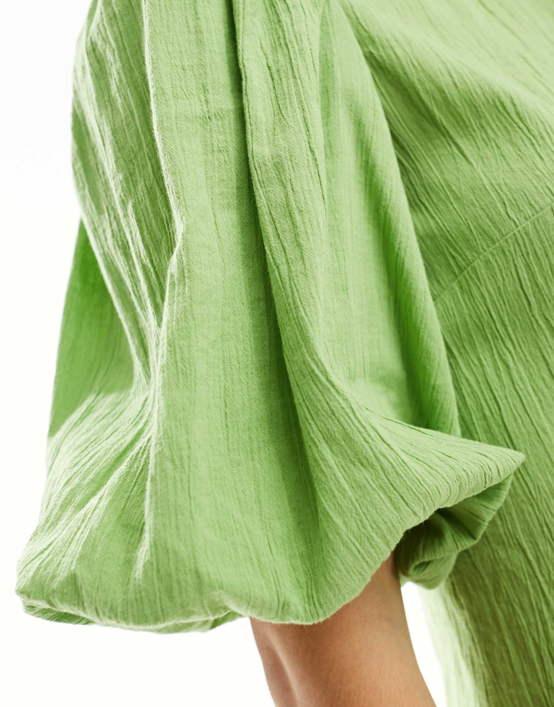 monki short balloon sleeve mini dress with pleated volume bottom in green