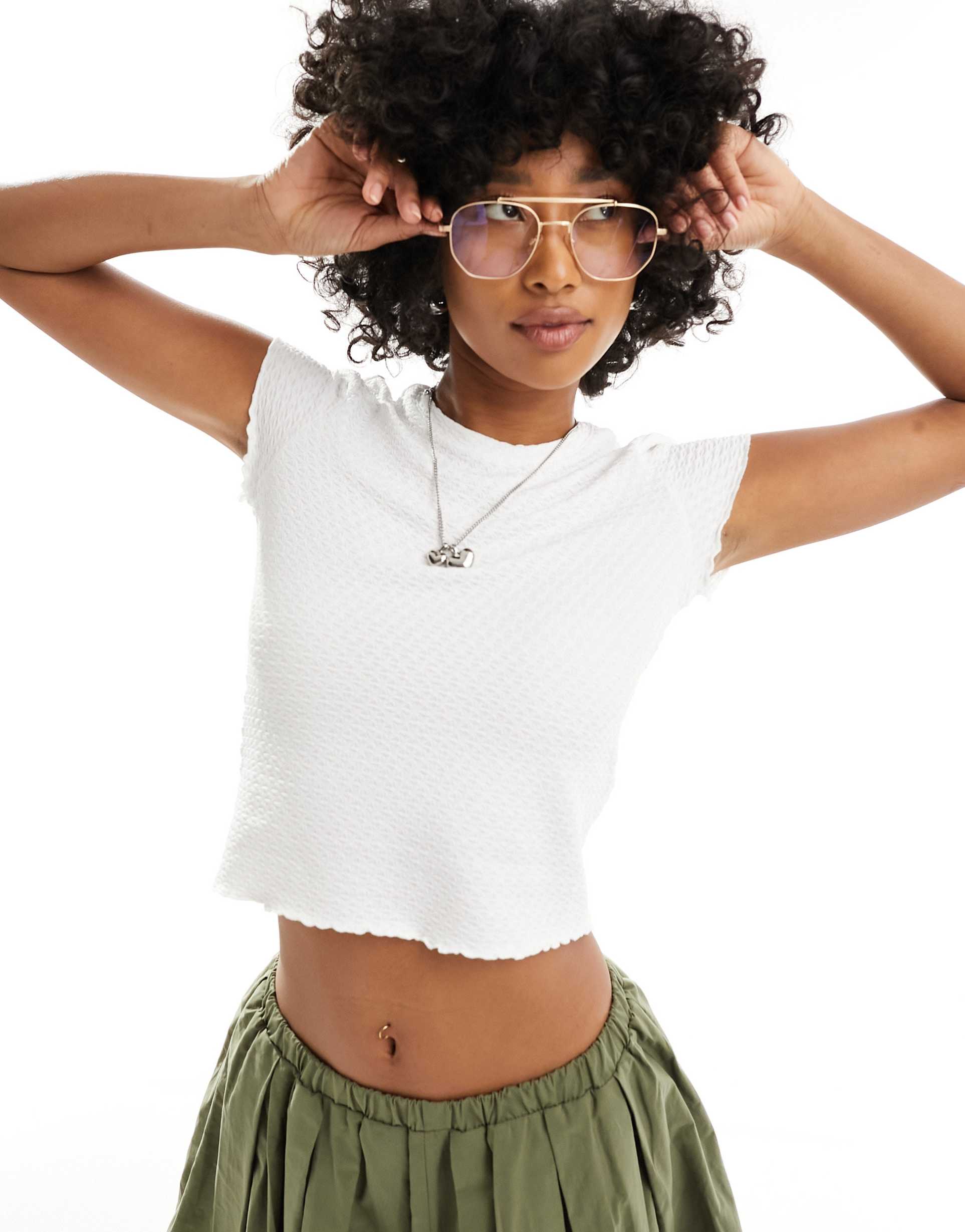 monki short sleeve crinkle t-shirt with lettuce hem detail in white