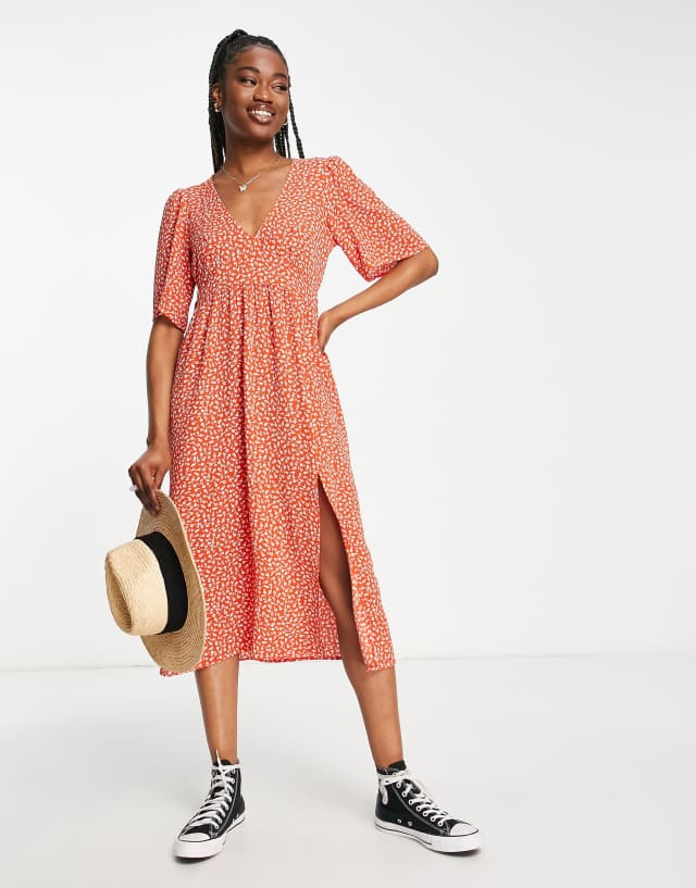 Monki short sleeve midi dress with side slit in ditsy floral