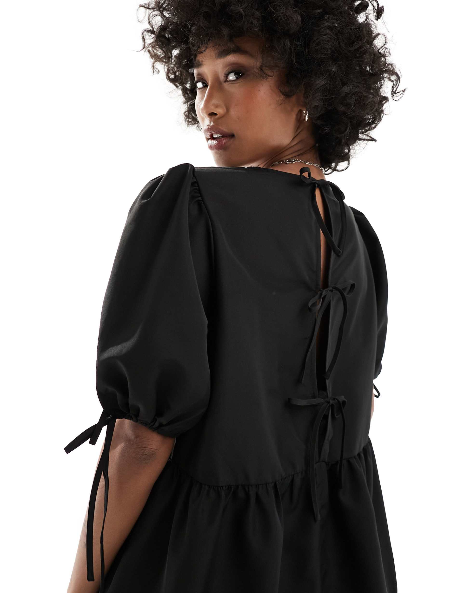 monki short sleeve mini tiered dress with bow detail in black