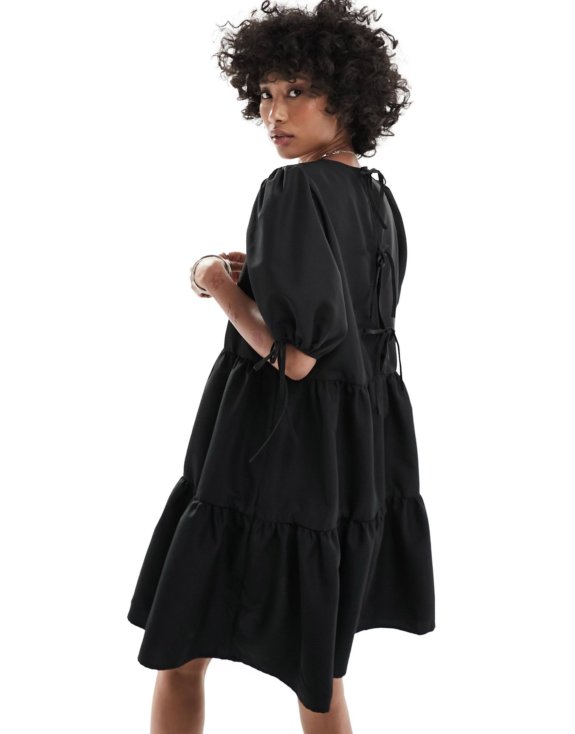 monki short sleeve mini tiered dress with bow detail in black
