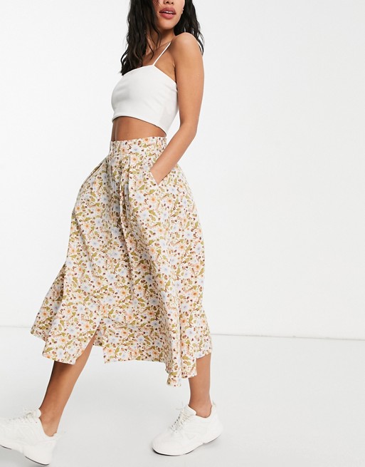 Monki Sigrid recycled button through floral print midi skirt in multi