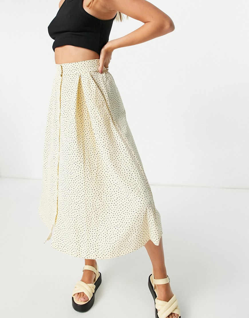 Monki Sigrid recycled button through midi skirt with in beige dot print-Neutral