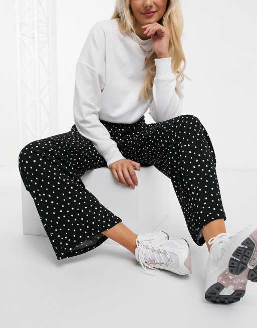 Monki - Sissela - Pantalon en jersey évasé à pois - Noir