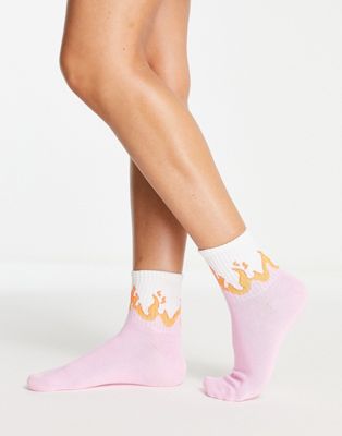 Monki socks with flame print in pink
