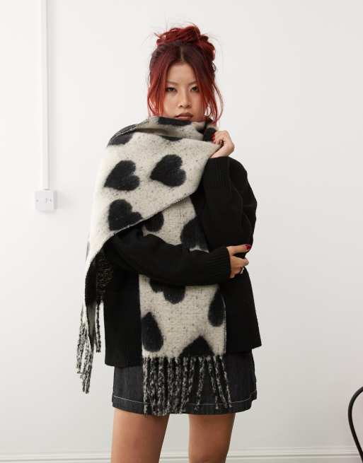 Monki soft chunky scarf in black with off white hearts | ASOS