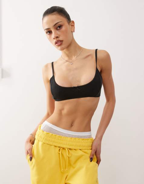 Monki soft scoop neck pointelle bralet with small bow in washed black - view 1