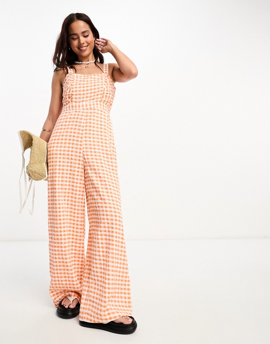 Monki square neck jumpsuit with front ruching in orange gingham