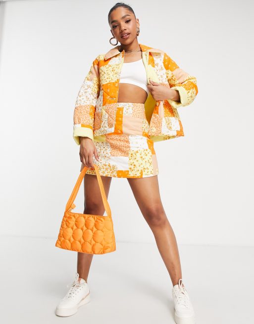 Monki – Steppjacke mit Patchwork-Design in Orange, Kombiteil