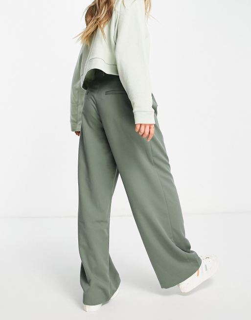 adidas Originals three stripe flared leggings in collegiate green