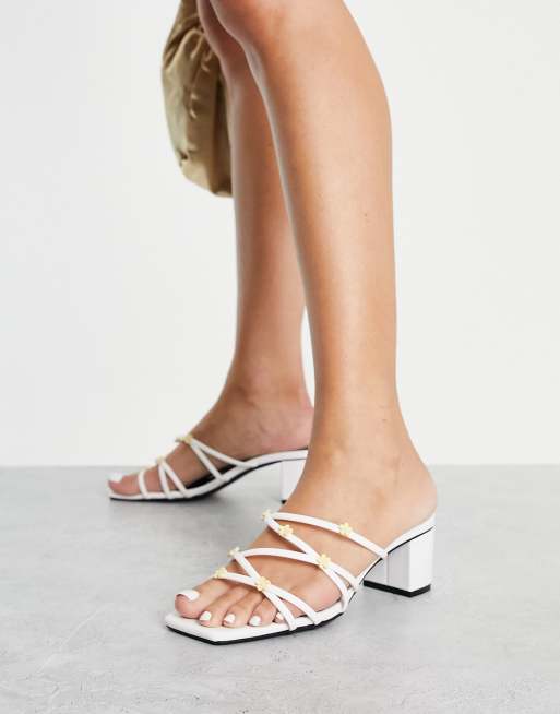 Monki strappy daisy heeled sandals in white ASOS