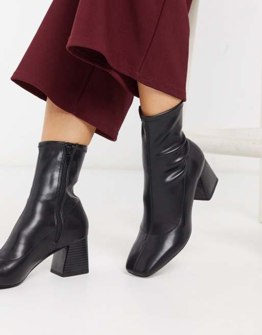 Monki stretch ankle boots with block heel in black | ASOS