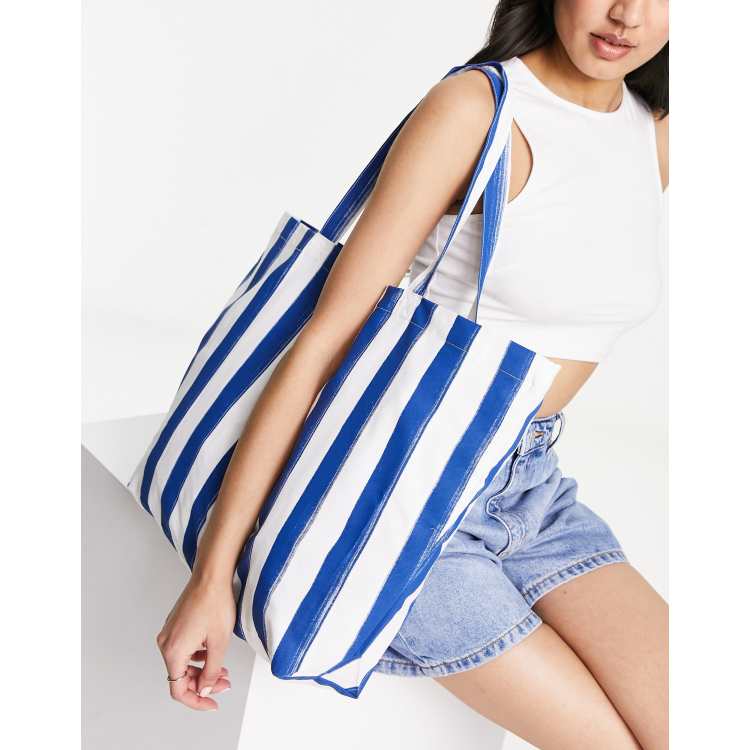 Blue and white 2025 striped tote bag