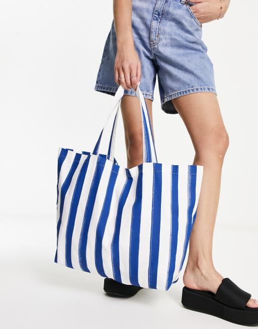 Blue and white shop striped beach bag