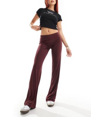 Monki Monki super soft low waist straight leg baggy jersey trousers in burgundy-Red