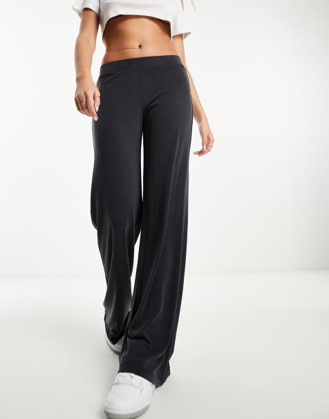 Monki super soft low waist wide leg jersey trousers in charcoal black - view 1