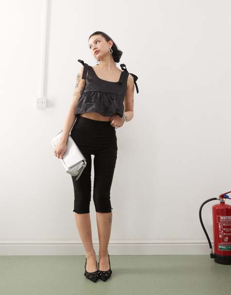 Monki – Svart linne i peplum-modell med rosettrem i satin - view 1
