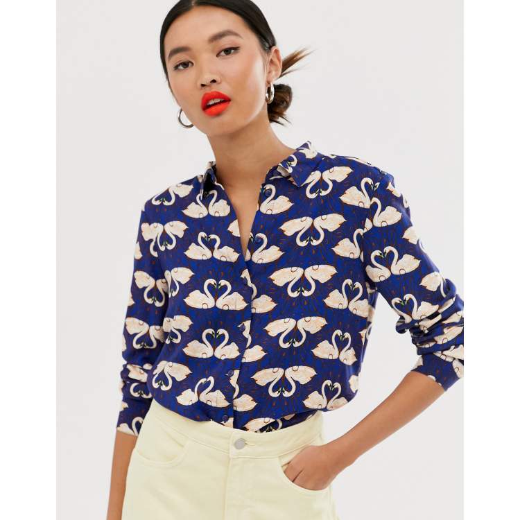 Monki swan print long sleeve blouse in deep blue