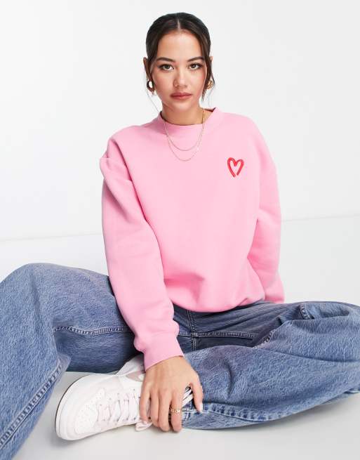 Monki sweatshirt with heart embroidery in pink