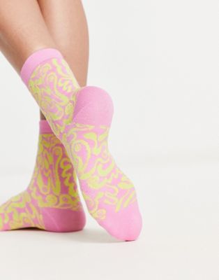 Monki swirl print ankle sock in pink and green
