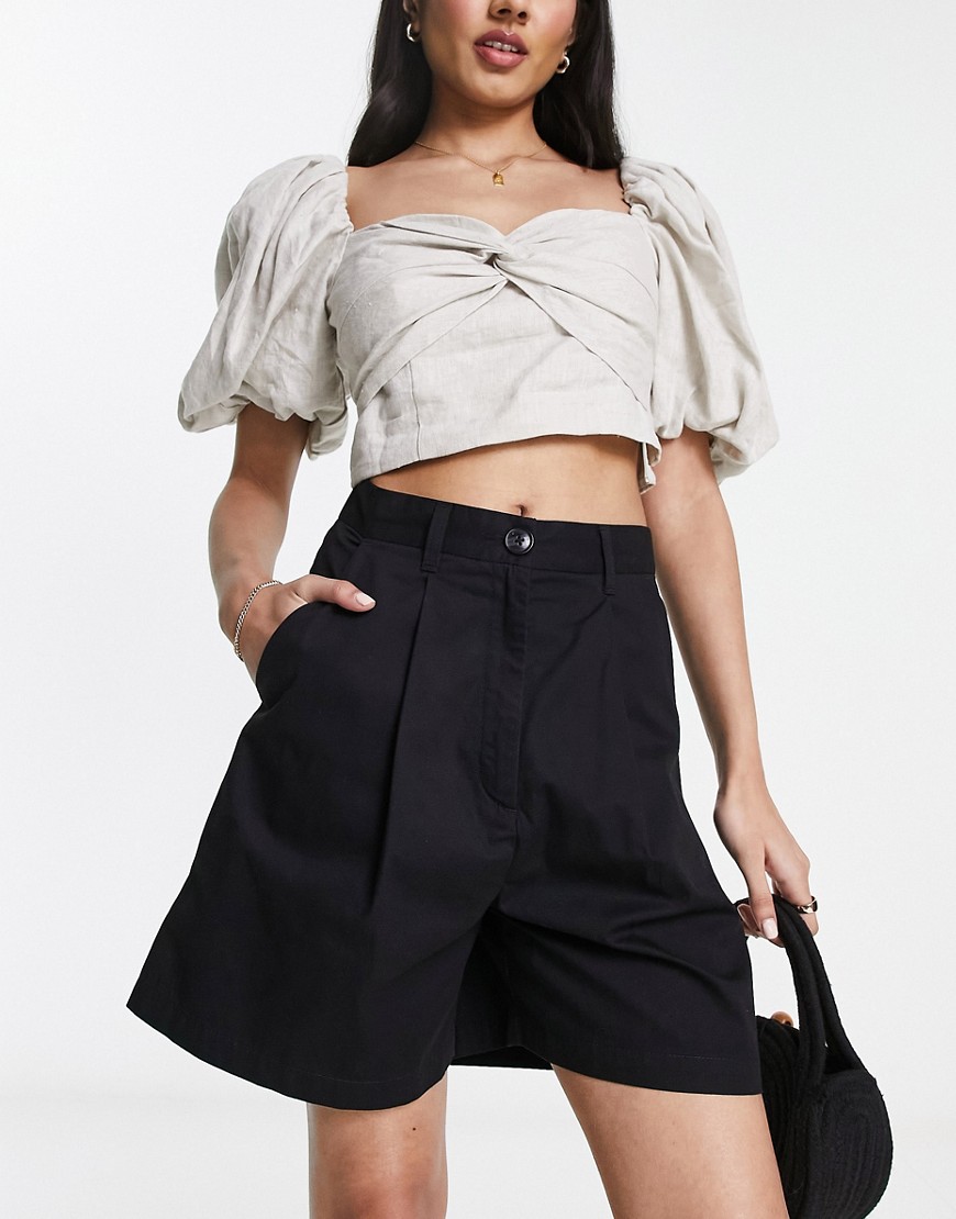 Monki tailored turn-up shorts in black