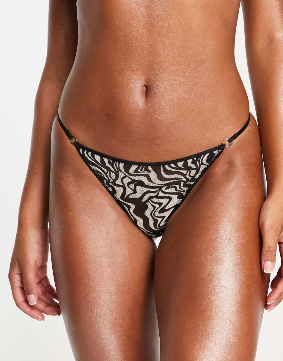 Monki thong in black swirl