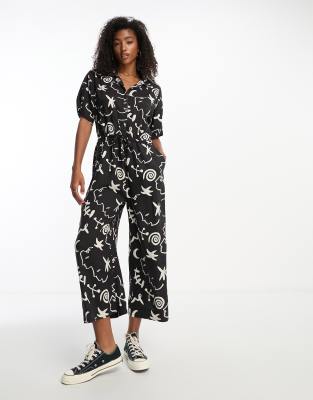 Monki Tie Waist Jumpsuit In Black And White Face And Moon Print-multi