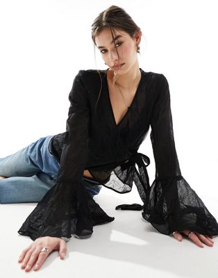 tie waist wrap blouse with fluted cuffs in black