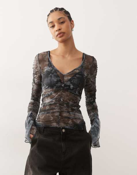 Monki - Top a maniche lunghe trasparente nero con stampa astratta e volant - view 1