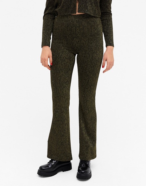Monki Tora flare trousers in black and gold glitter