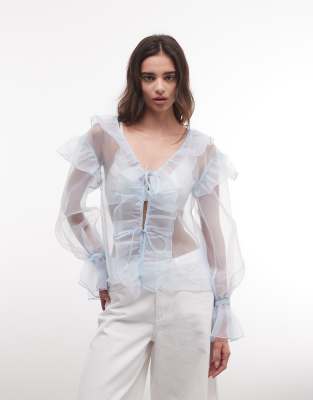 Monki - Transparente, langärmlige Bluse in Hellblau mit Rüschen