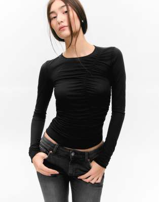 Monki - Transparentes Slim Fit Oberteil in Schwarz mit Frontdetail