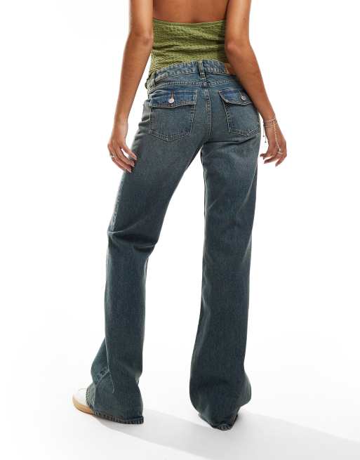 Monki Trudy low waisted flared jeans in canyon dark blue