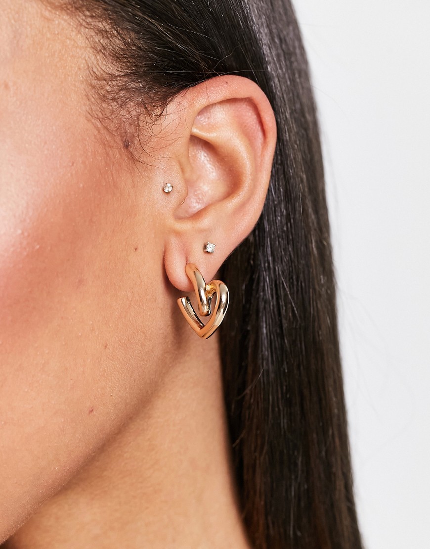 Monki twisted heart earrings in gold