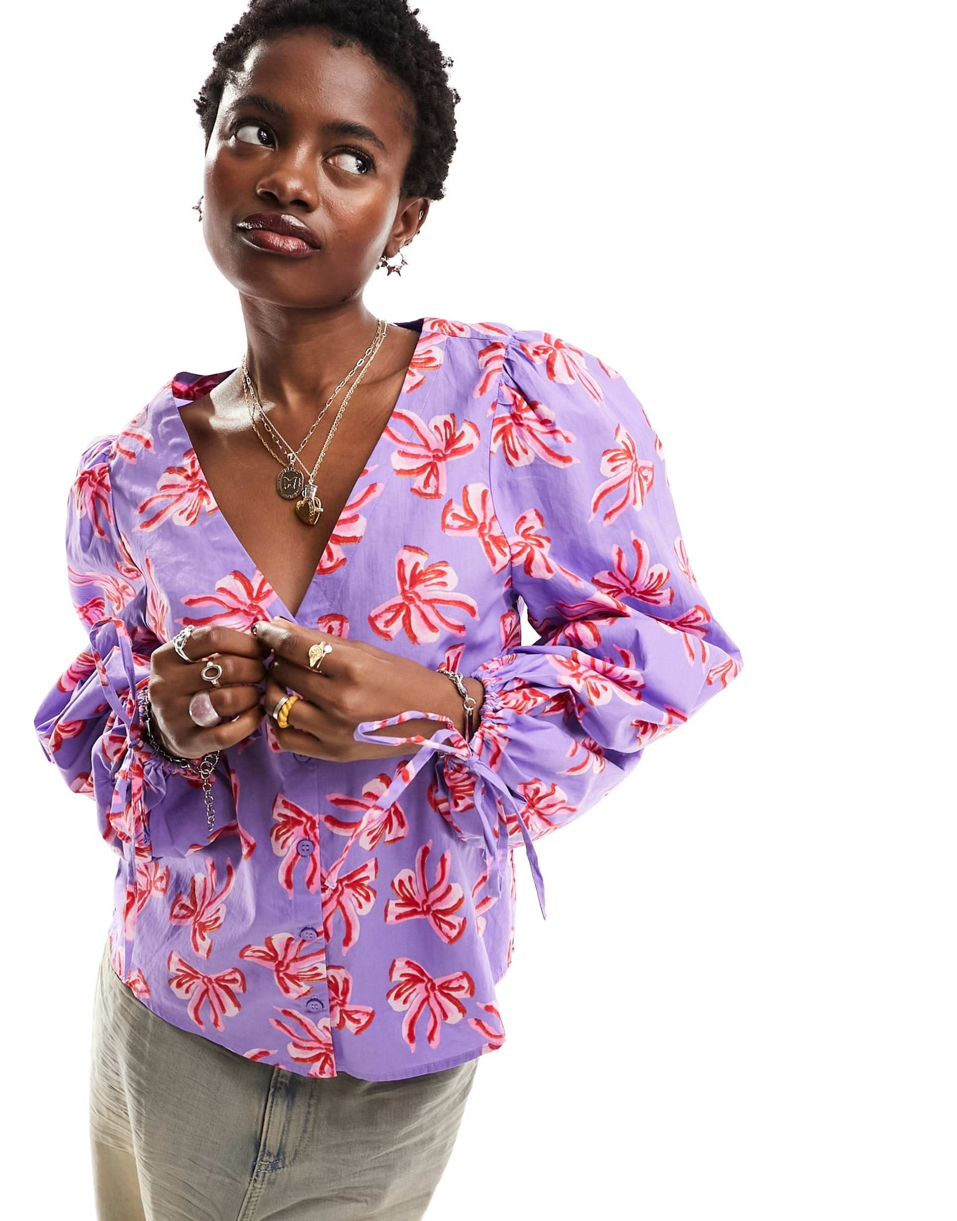 monki v neck blouse with balloon sleeves in bow print