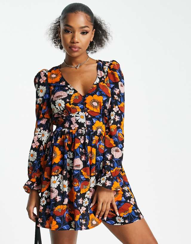 Monki V-neck smocked mini dress in floral print