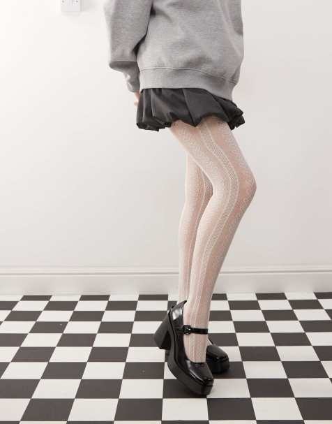 Monki – Vita, pointellestickade tights - view 1