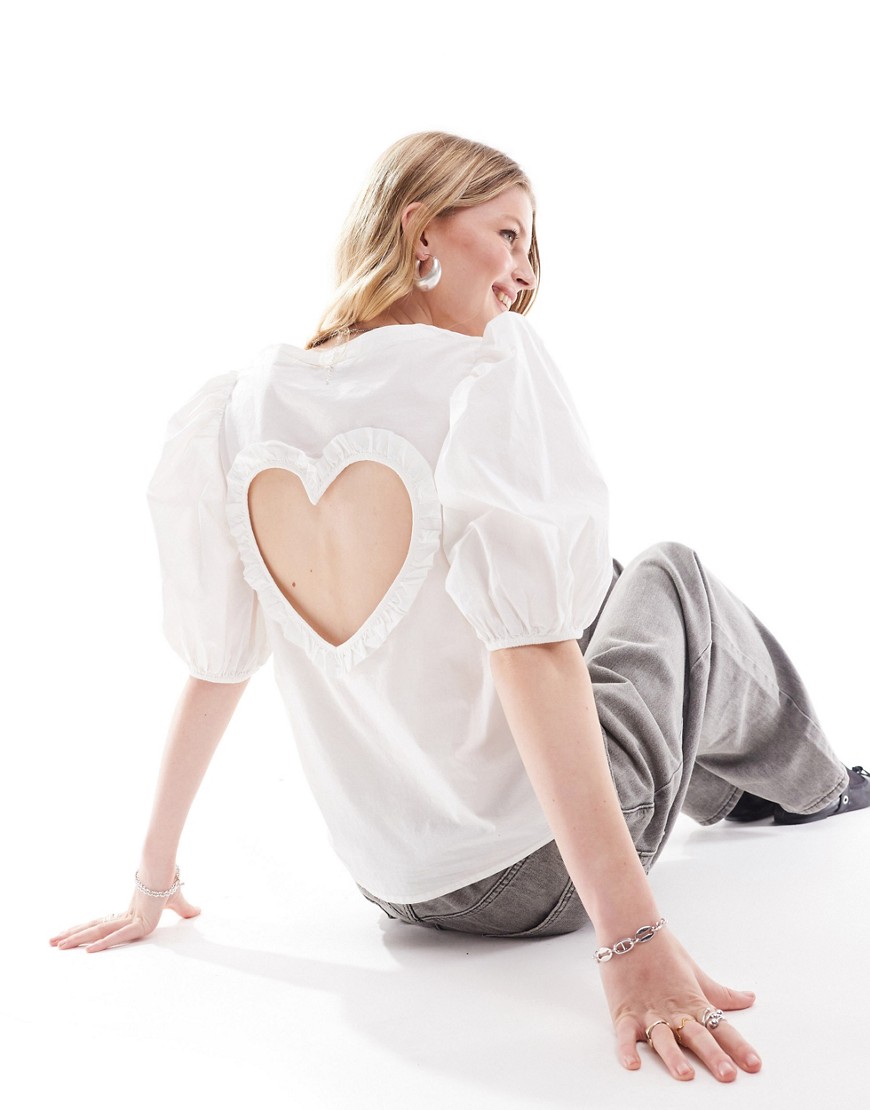 Monki volume short sleeve v neck blouse with open back heart detail in white