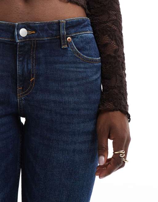 Monki Wakumi low waist boot cut jeans in dark blue wash ASOS