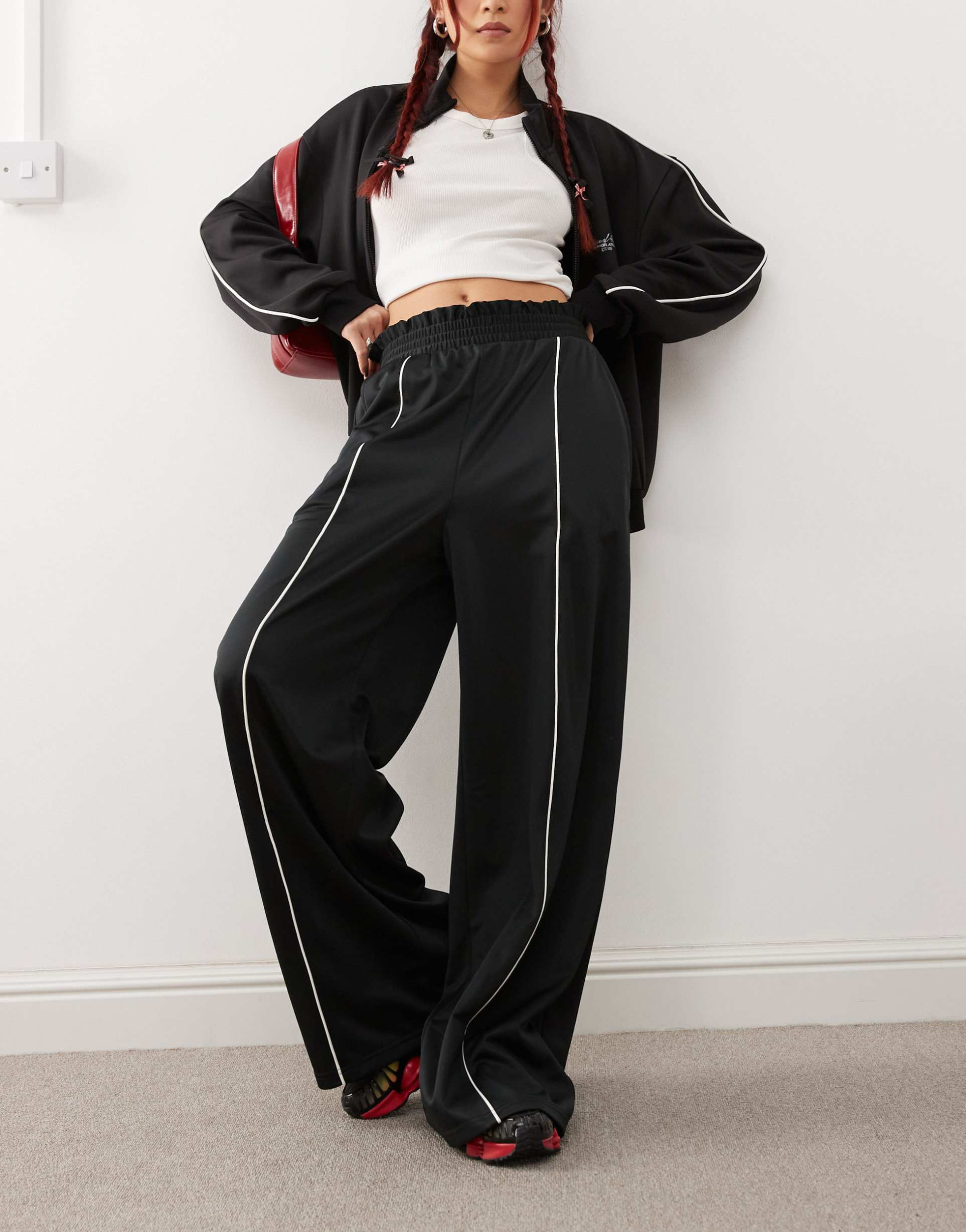 monki wide leg pull-on track pants with front stripe in black