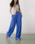 [Monki] Monki wide leg pull on track pants with white piping in blue XS Blue