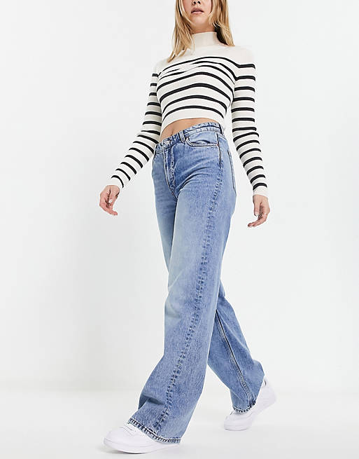 Lol Pellen op gang brengen Monki - Yoko - Jeans met wijde pijpen in middenblauw | ASOS