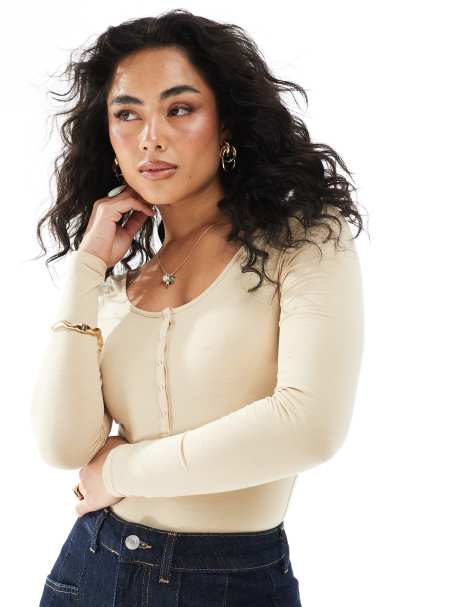 Monki long sleeve bodysuit with button detail in ecru