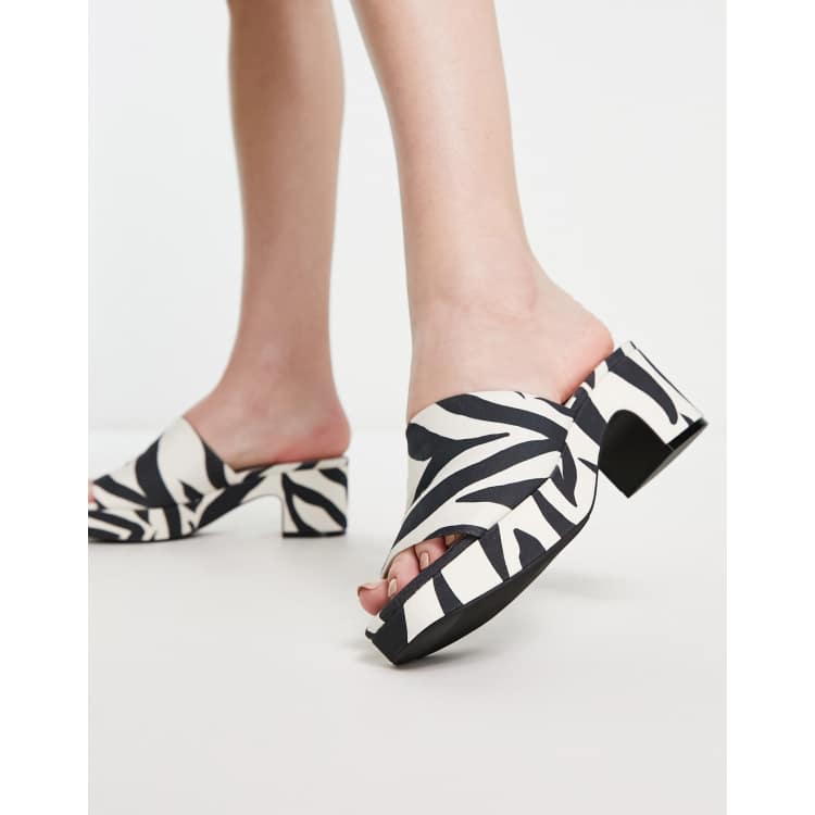 Black and white 2025 mules with heels