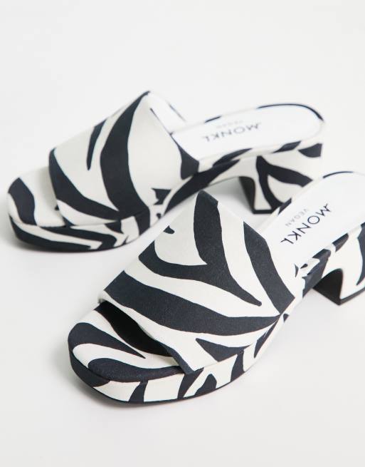 Monki zebra print mid chunky heeled platform mules in black and white