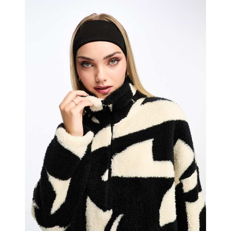 Monki zip up pull over fleece in black and cream abstract print