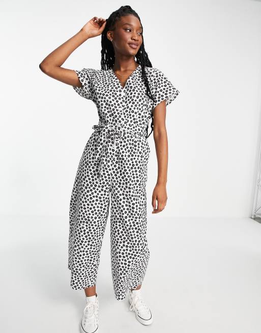 Mono corto blanco con estampado floral negro y lazada en la cintura de algodón orgánico Rocco de Monki