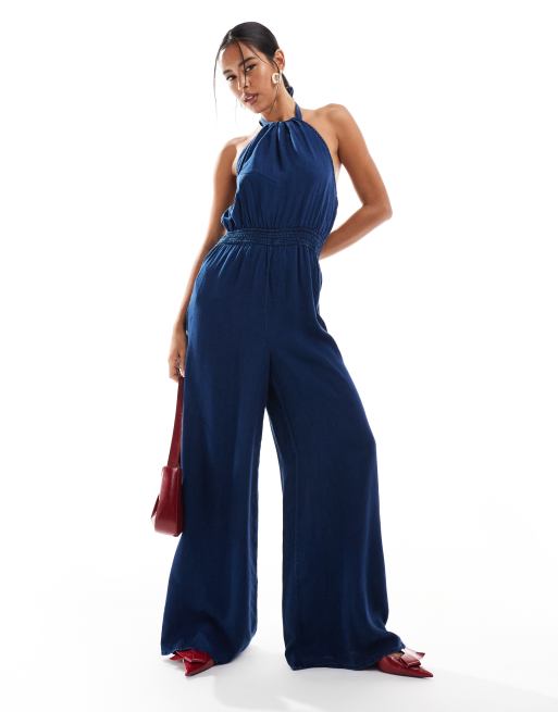 Mono largo azul oscuro con cuello halter de tejido efecto denim de Mango