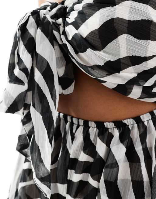 Miss Selfridge beach chiffon tie front romper in zebra print