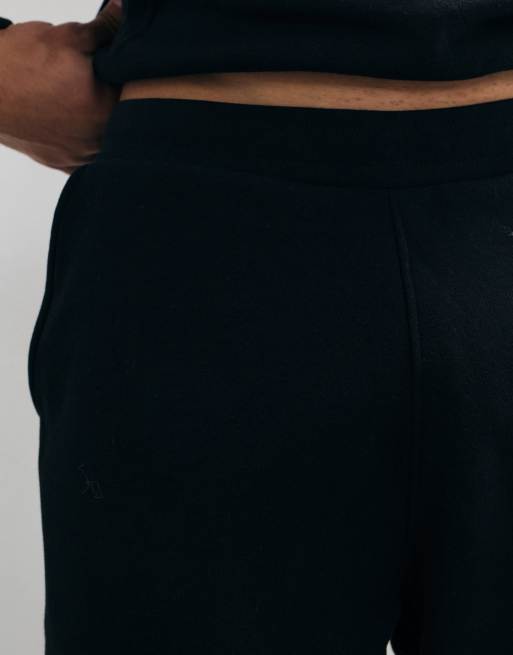 Montirex Essential fleece trackies with logo in black, 4 of 5